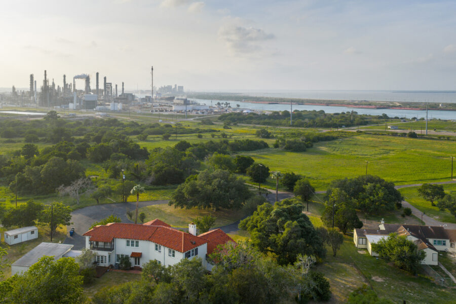 A Valero refinery is seen behind a residential area on May 5 in Corpus Christi, Texas. Credit: Brandon Bell/Getty Images