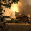 Smoke rises behind a residential area as a wildfire burns in Gironde, France, on July 23, 2026. New research suggests that dangerous conflagrations like the Gironde wildfire will become more common in the future. Credit: Julien De Rosa/AFP via Getty Images