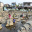 Children play in the shrinking waters of the Ciliwung River in Bogor, Indonesia, on July 27 amid drought conditions intensified by this year’s El Niño. Credit: Agoes Rudianto/Anadolu via Getty Images