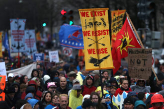 People march during a demonstration against the Dakota Access Pipeline on March 10, 2017, in Washington, D.C. Credit: Justin Sullivan/Getty Images