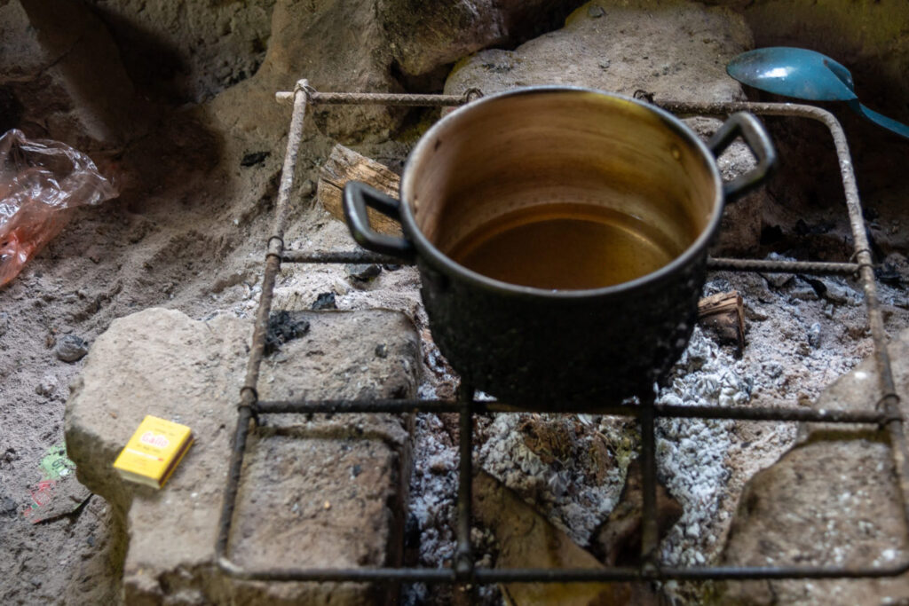A discarded plastic bag sits next to the stove in Sandra Mungiya Marcos’s home in the Santa María Xalapán mountains.