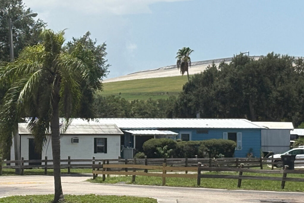 Dust from gypstacks can blow into nearby communities, make its way into the groundwater or decay into a gas and drift through the air. Credit: Amy Green/Inside Climate News
