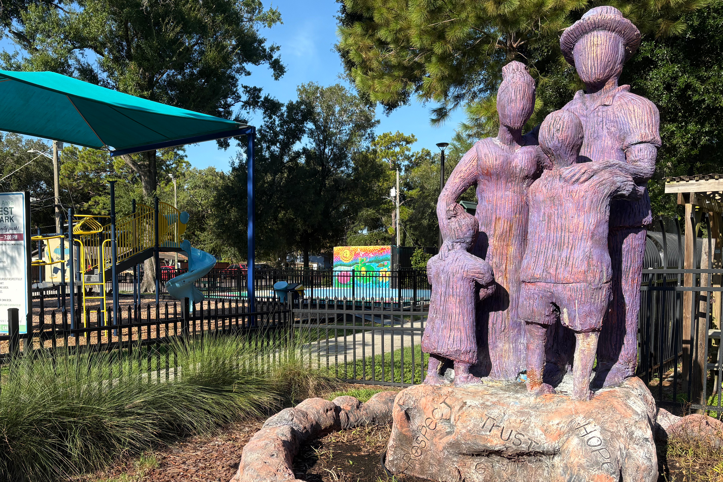 Harvest Hope Park features a vegetable garden, playground, splash pad and artfully painted community gathering place. Credit: Amy Green/Inside Climate News