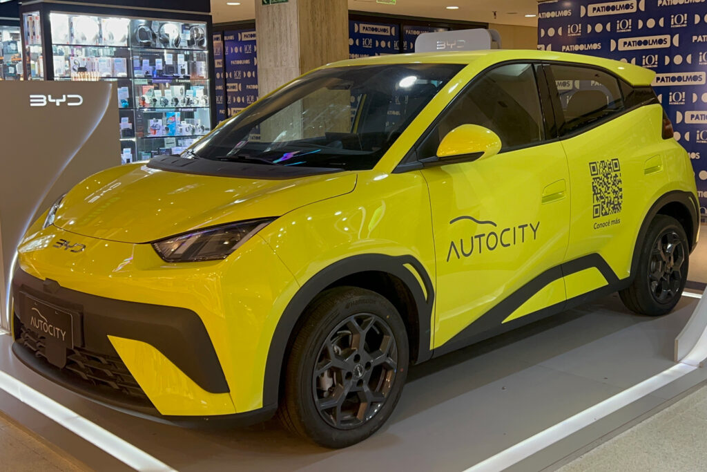 A yellow BYD Dolphin Mini on display at the Patio Olmos mall in central Córdoba on May 9. Credit: Katie Surma/Inside Climate News