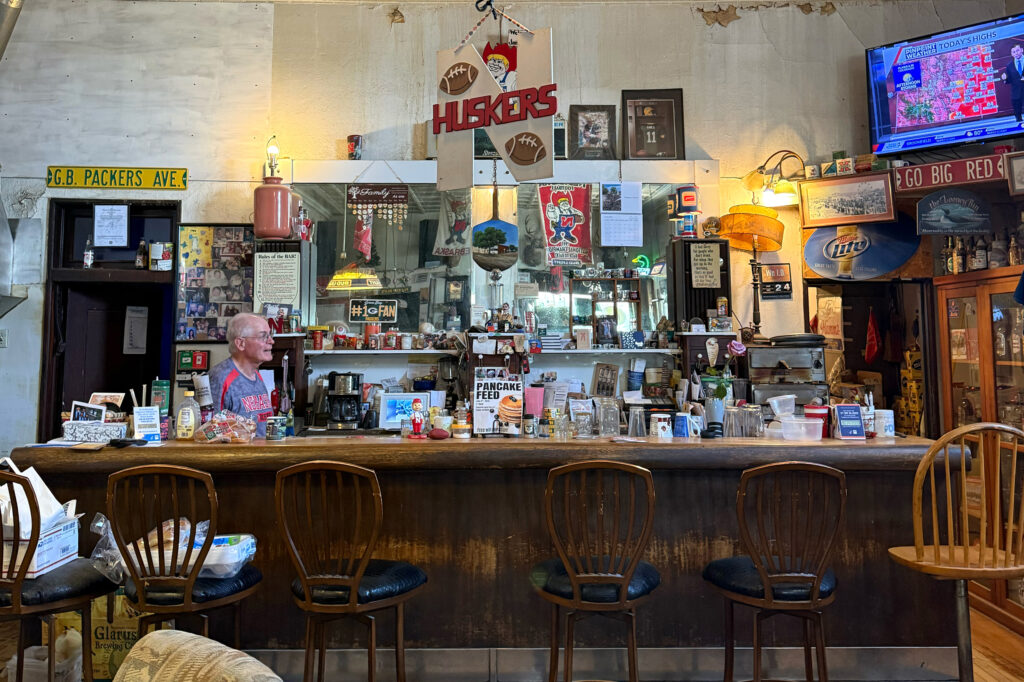 Jake’s Place, a bar and gathering place in Haigler, displays its allegiance to the Nebraska Cornhuskers football team. Credit: Georgina Gustin/Inside Climate News