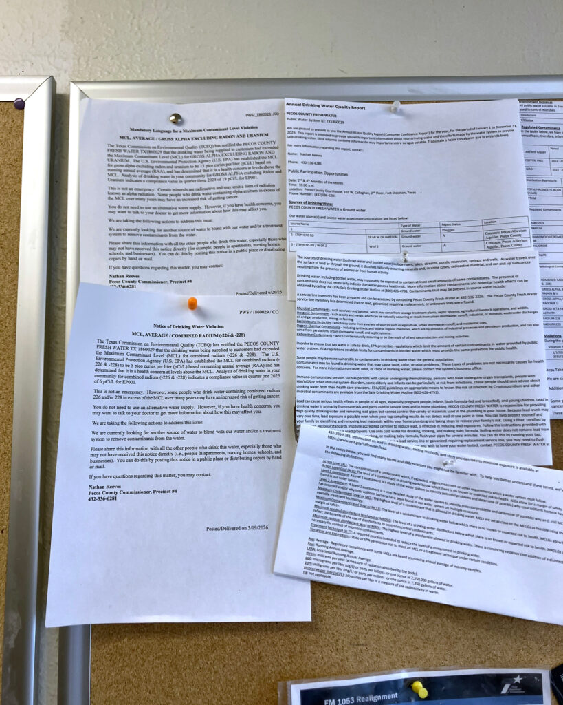 A notification of drinking water standard violations is posted at the Imperial Post Office in June. Credit: Martha Pskowski/Inside Climate News