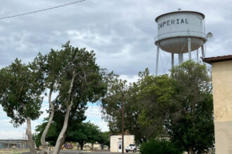 A water tower looms over the small town of Imperial in Pecos County, Texas, where for years drinking water has had excess radium. Credit: Martha Pskowski/Inside Climate News