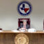 Commissioner Wayne Christian (left) introduces a new public participation policy during the Railroad Commission of Texas meeting on Tuesday. Source: RRC Webcast