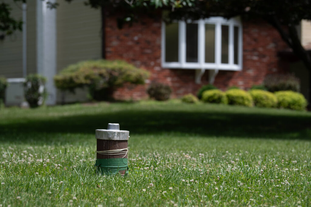 A water well sits in front of a home on Spencer Road, which was purchased by Energy Transfer soon after the company discovered the spill. Credit: Tracie Van Auken/Inside Climate News