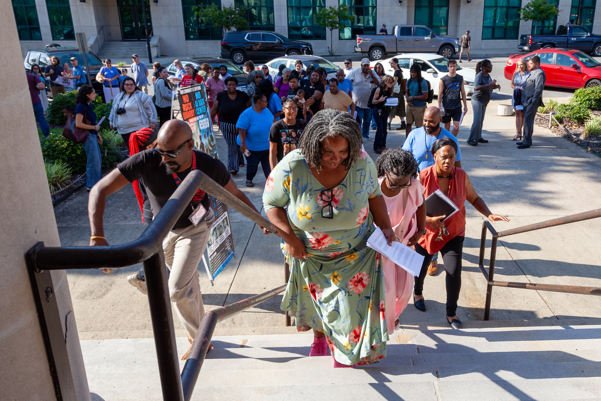 Yolanda Steele (center) and Shaun Ingram (left) are among the hundreds of Richmond County residents who told state officials at a public hearing to deny the air permits for Amazon and Duke Energy. Credit: Lisa Sorg/Inside Climate News