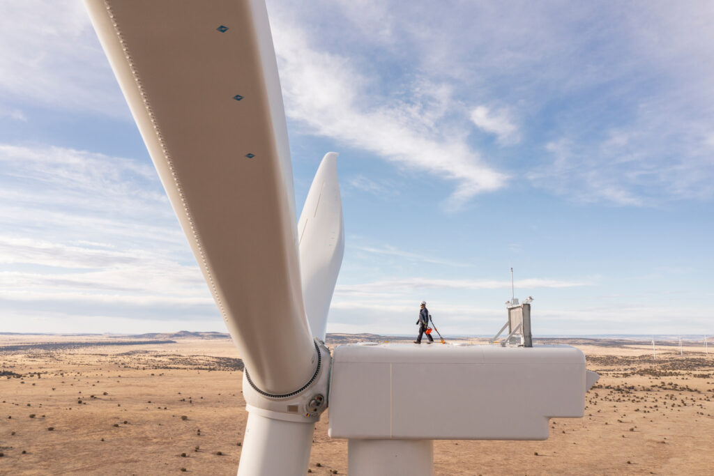 A worker walks on a turbine at the SunZia wind project in New Mexico. Credit: GE Vernova