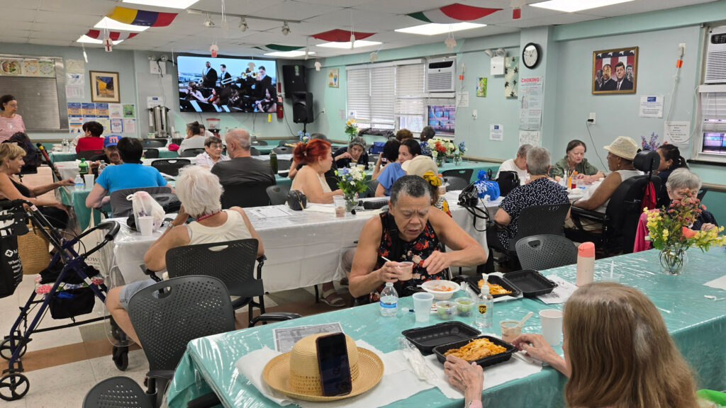 People gather at the Swinging Sixties Social Adult Day Center run by St. Nick’s Alliance. Credit: Courtesy of St. Nick’s Alliance