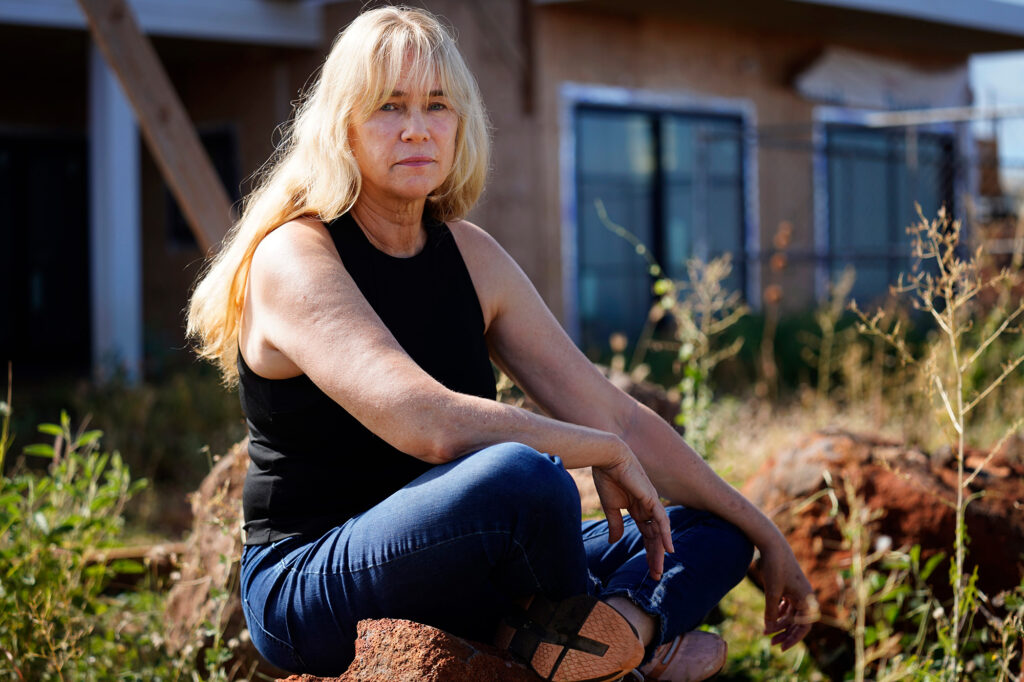 Krista Woodward is photographed at her stalled home reconstruction on July 1 in Lahaina. Credit: Kevin Fujii/Civil Beat