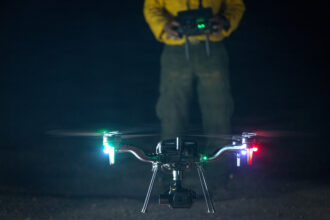 Uncrewed aircraft specialists deploy a drone to detect hot spots as the Timber Fire burns in Los Padres National Forest on Aug. 30 near Big Sur, Calif. Credit: Andrew Avitt/U.S. Forest Service