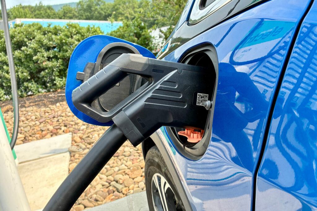 Many EVs, like the 2017 Chevrolet Bolt, are not compatible with Tesla Superchargers, the nation’s largest network of charging stations. Experts say that's why federal funding for EV charging has focused on stations that are compatible with all makes and models. Credit: Kyle Bagenstose/Inside Climate News