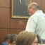 Chris Hopkins (right), who organized opposition to the asphalt plant, attends the Aug. 27 Forsyth County Commissioners meeting. Credit: Lisa Sorg/Inside Climate News