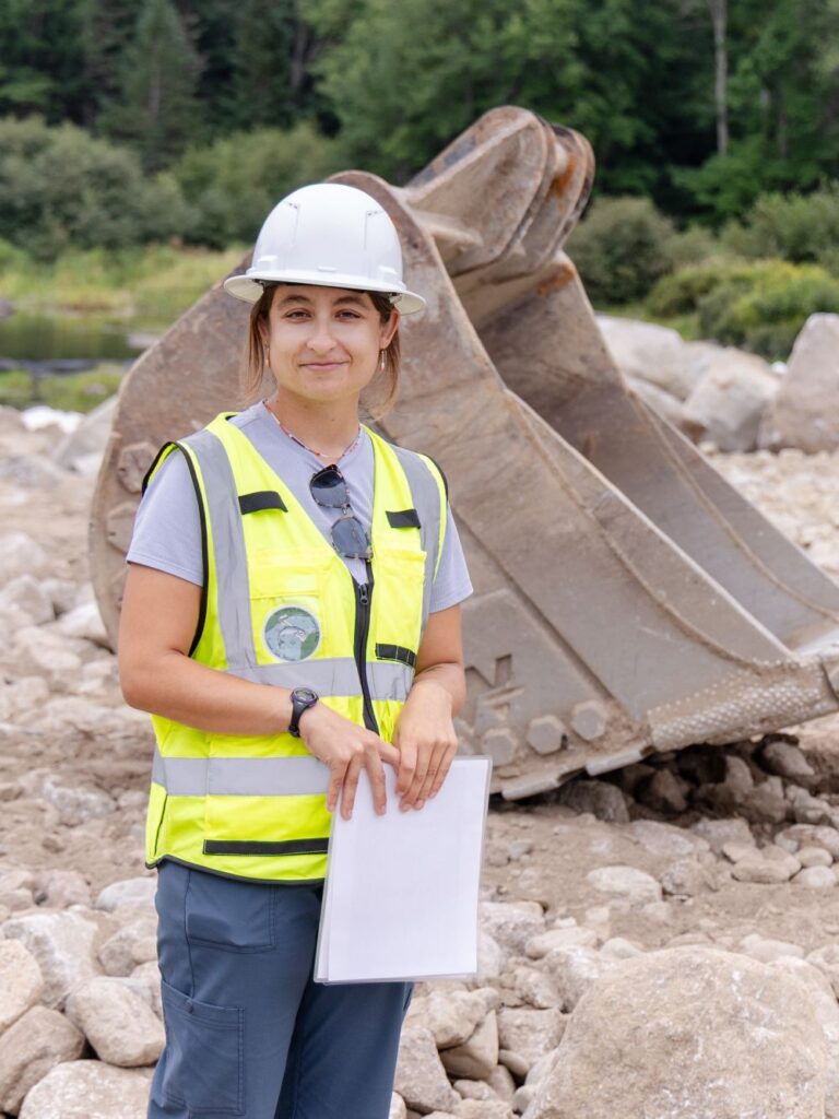 Ellie Mason, a habitat restoration project manager with the Downeast Salmon Federation, is providing a voice for salmon and other wildlife during all the day-to-day construction decisions. Credit: Katherine Emery/The Maine Monitor