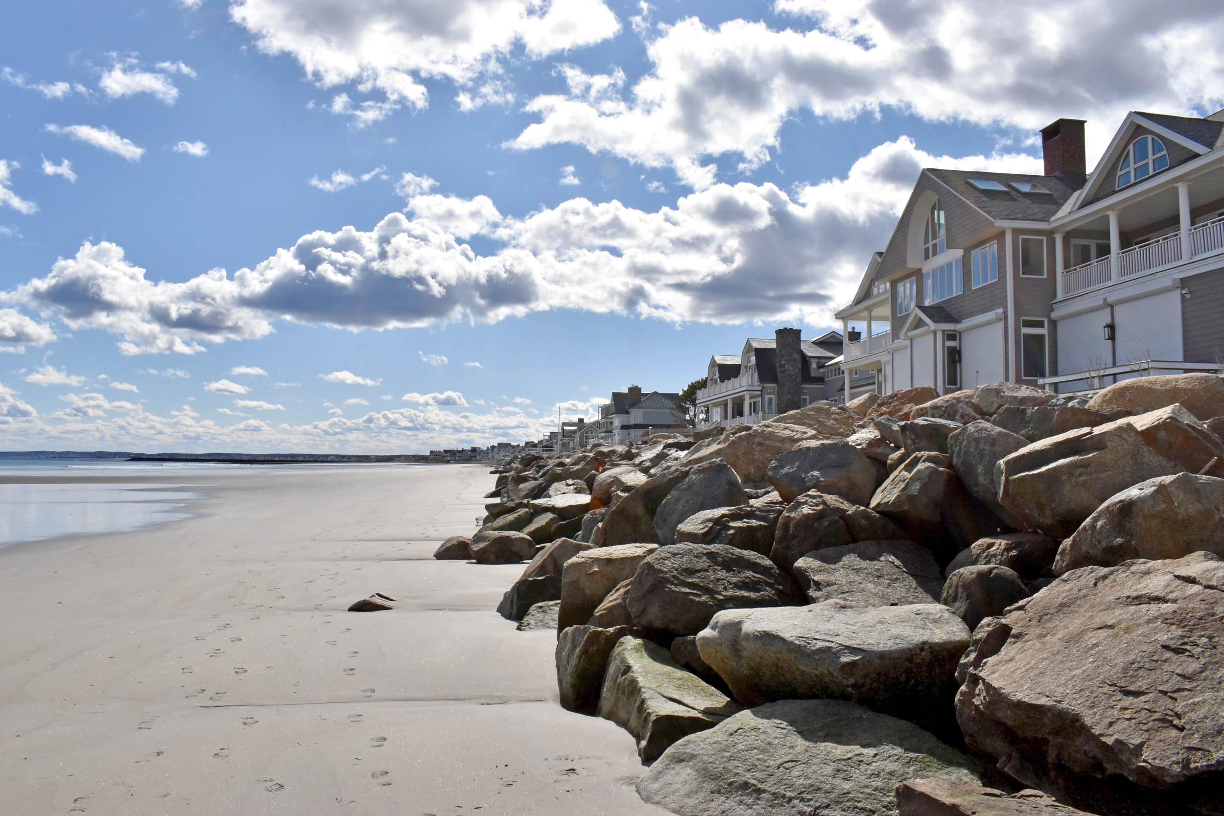 The town of Wells was hit especially hard by the 2024 winter storms and has seen a mix of riprap seawall and dune restoration projects to stabilize its shoreline. Credit: Emmett Gartner/Inside Climate News