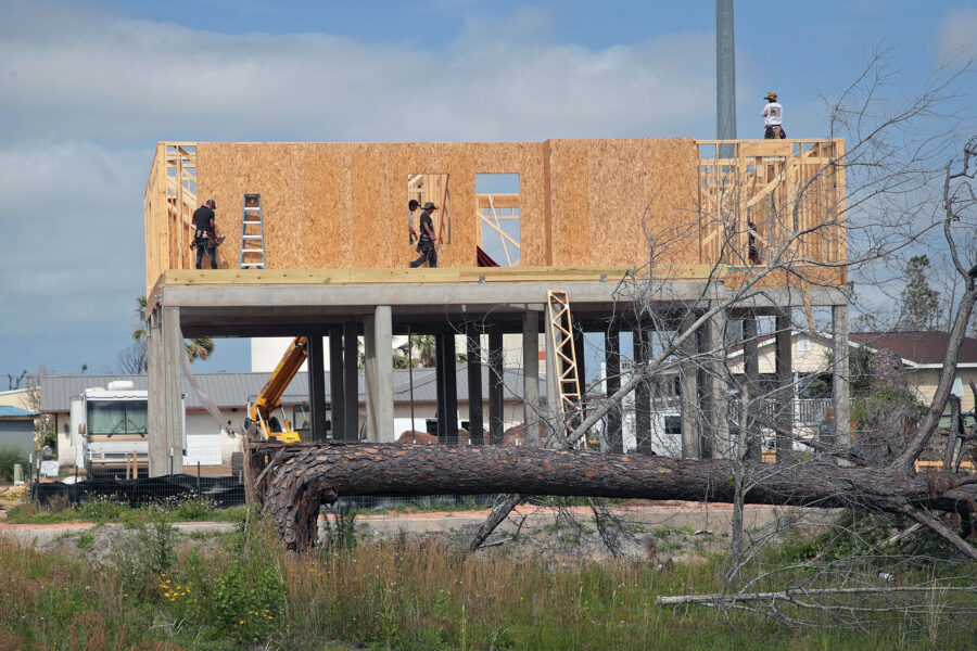 Workers rebuild a home destroyed by Hurricane Michael on May 9, 2019, in Mexico Beach, Fla. Credit: Scott Olson/Getty Images