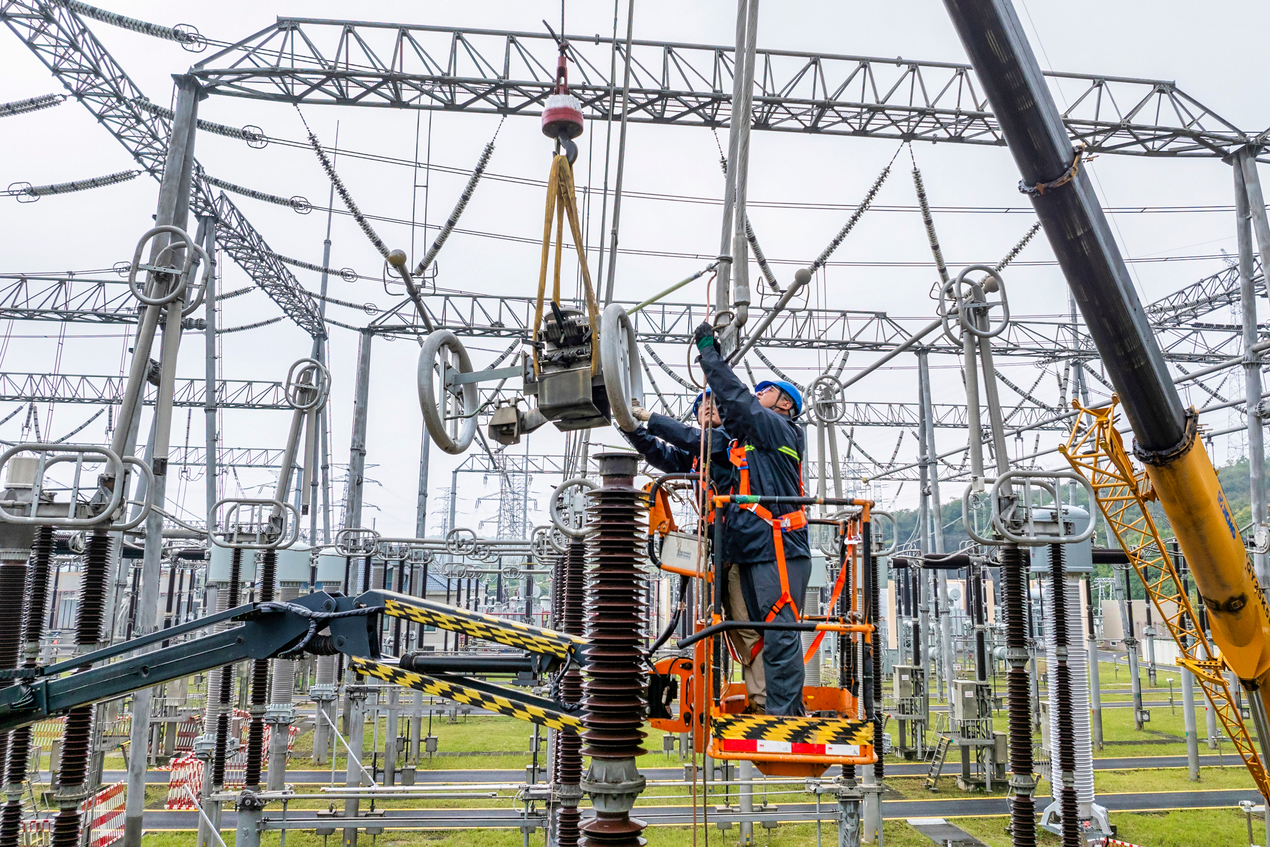 Workers conduct maintenance at a substation in Nanjing, China, on Oct. 22, 2024. Credit: Costfoto/NurPhoto via Getty Images