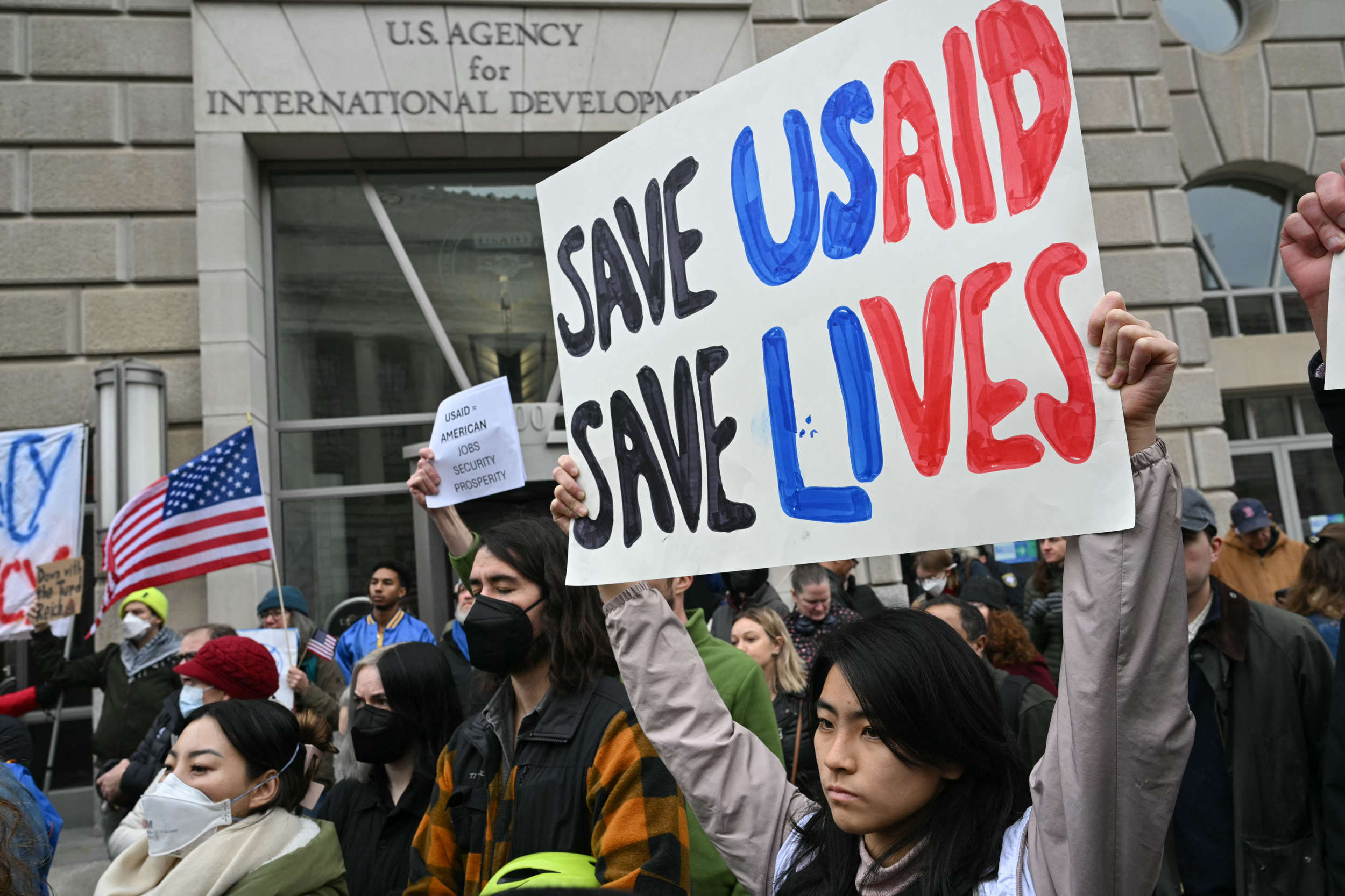 People protest outside of USAID headquarters in Washington, D.C., on Feb. 3, 2025. Credit: Mandel Ngan/AFP via Getty Images