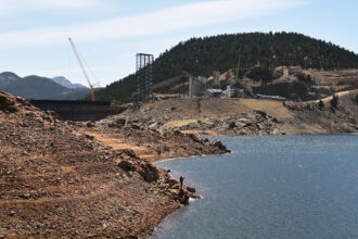 Construction at Denver Water’s Gross Reservoir expansion is seen on April 9, 2025, in Boulder County, Colorado. Credit: RJ Sangosti/MediaNews Group/The Denver Post via Getty Images