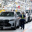 Cars move through the assembly line at a BMW manufacturing plant in Greer, S.C. Credit: Sven Hoppe/dpa via Getty Images