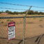 A sign warns of radiation danger at the site of an abandoned uranium mine on Navajo Nation land in Mariano Lake, N.M. Credit: Jim West/UCG/Universal Images Group via Getty Images