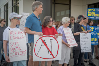 Rockland County residents demonstrate outside the Orangetown Town Hall to protest a proposed data center in the area. Credit: Erik McGregor/LightRocket via Getty Images