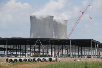 The construction site of an Amazon Web Services data center is seen in front of a nuclear power plant on July 3 in Berwick, Pa. Credit: Paul Weaver/SOPA Images/LightRocket via Getty Images