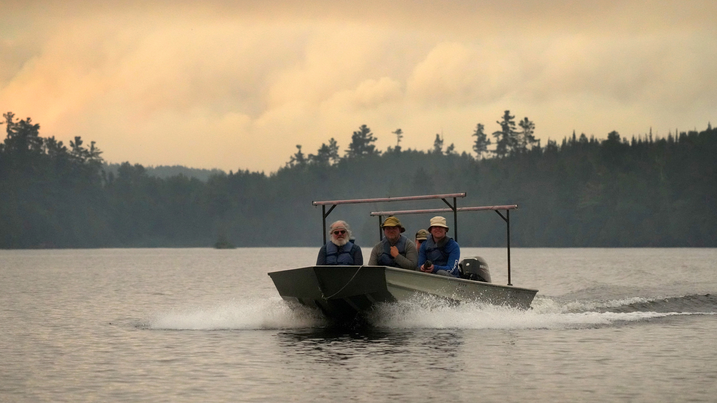 Forest Service employees evacuate canoeists as wildfires burn in the Boundary Waters Canoe Area Wilderness on July 14 in Ely, Minn. Credit: Anthony Soufflé/The Minnesota Star Tribune via Getty Images