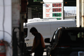 Prices are displayed at a Brooklyn gas station on Sept. 4 in New York City. Credit: Spencer Platt/Getty Images