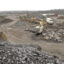 Machinery sits idle at a quarry in Gorham, Maine. Credit: John Patriquin/Portland Press Herald via Getty Images
