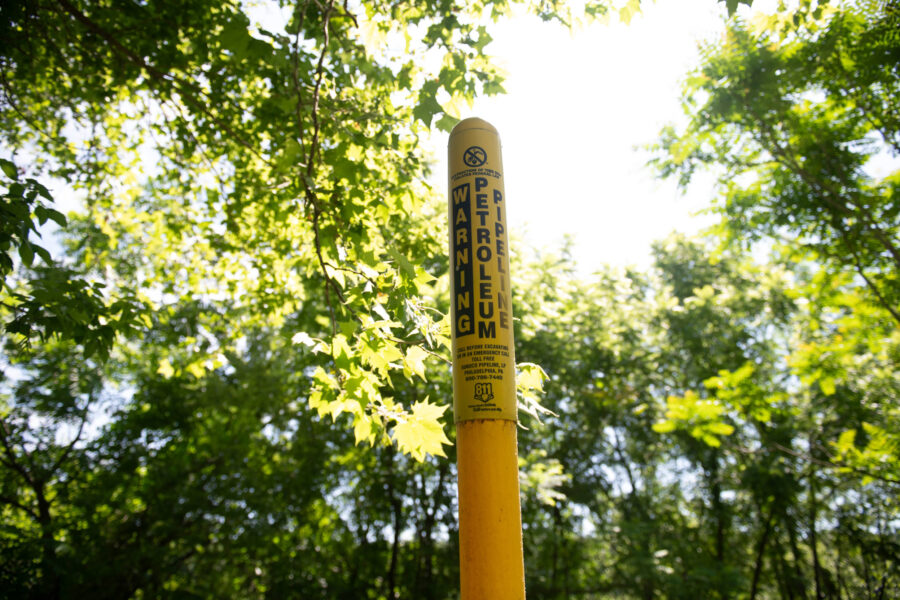 A marker for an Energy Transfer petroleum pipeline stands near the Delaware River in Upper Makefield Township, Pa. Credit: Tracie Van Auken/Inside Climate News