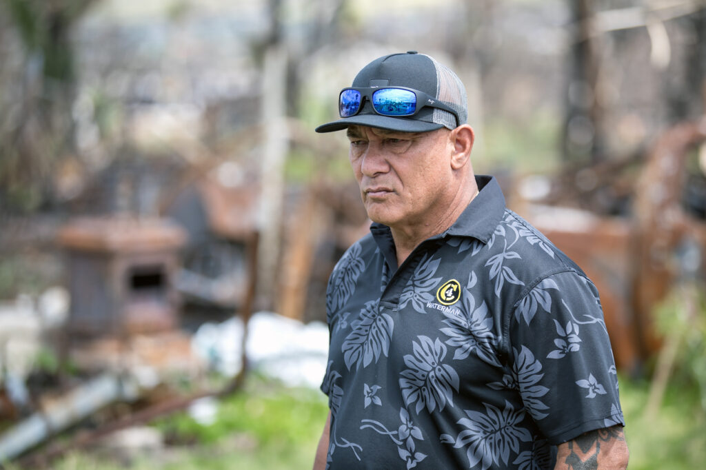 Archie Kalepa walks through the burn zone in Lahaina on March 12, 2024. Credit: Nathan Eagle/Civil Beat