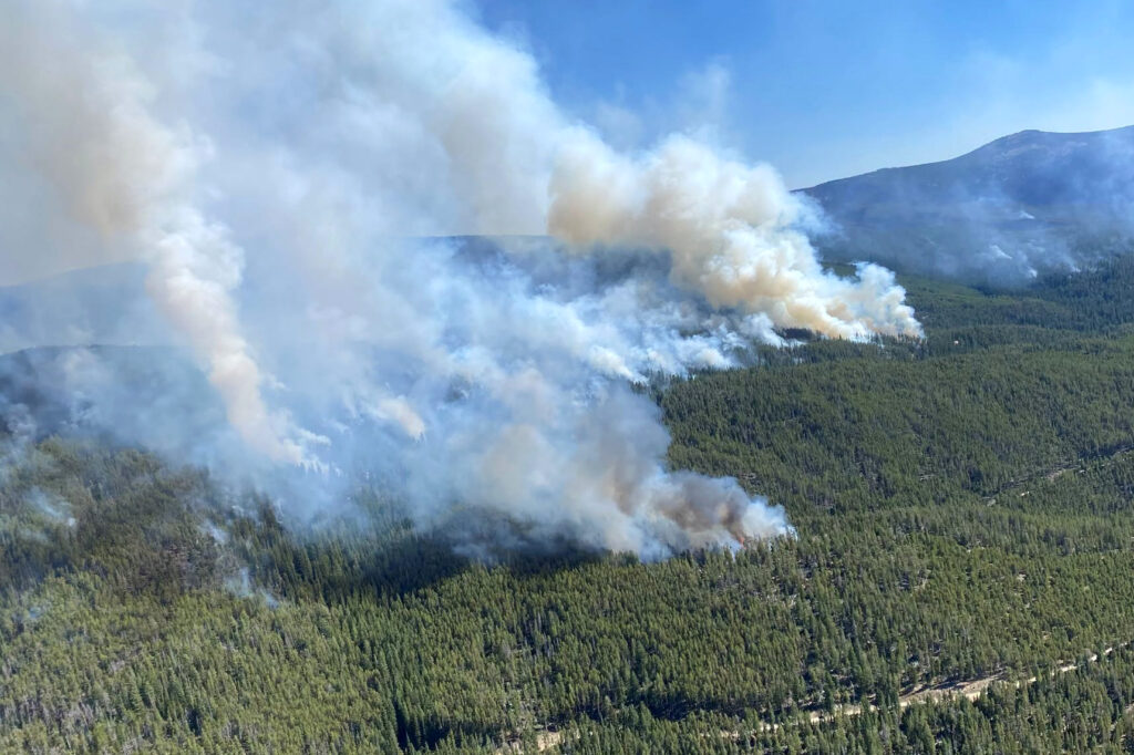 Smoke rises from the Sand Creek Fire as crews work to establish control lines on Sept. 1. Credit: Northern Rockies Complex Incident Management Team