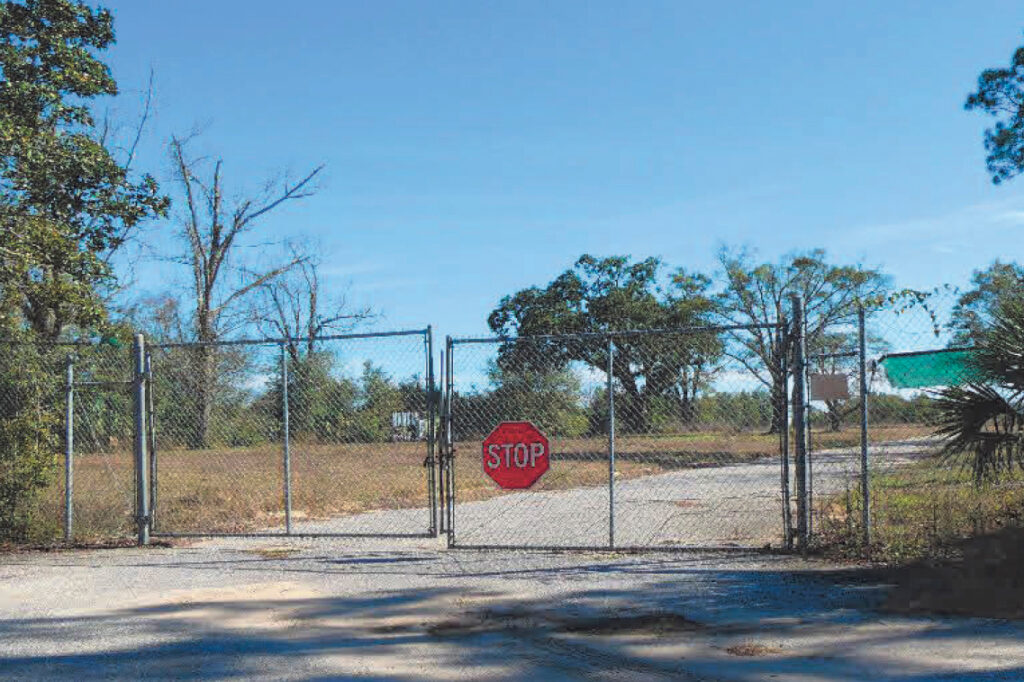 The entrance to the former site of the Escambia Wood Treating Company on Beggs Lane. Credit: EPA