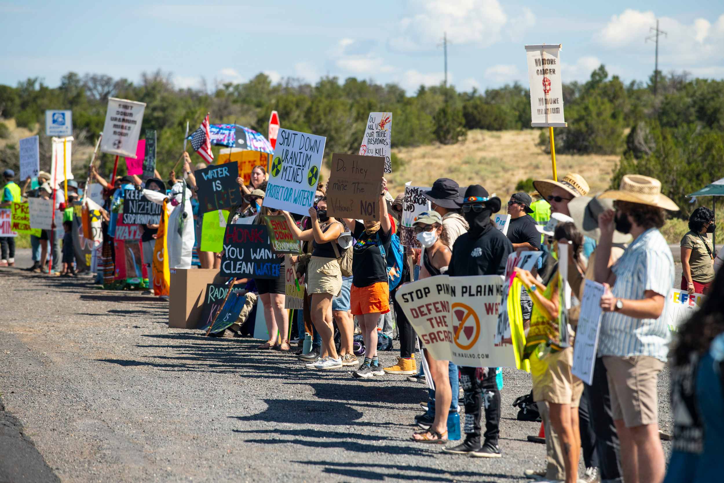 Protesters voice their opposition to uranium hauling from the Pinyon Plain Mine in Arizona. Credit: Blake McCord