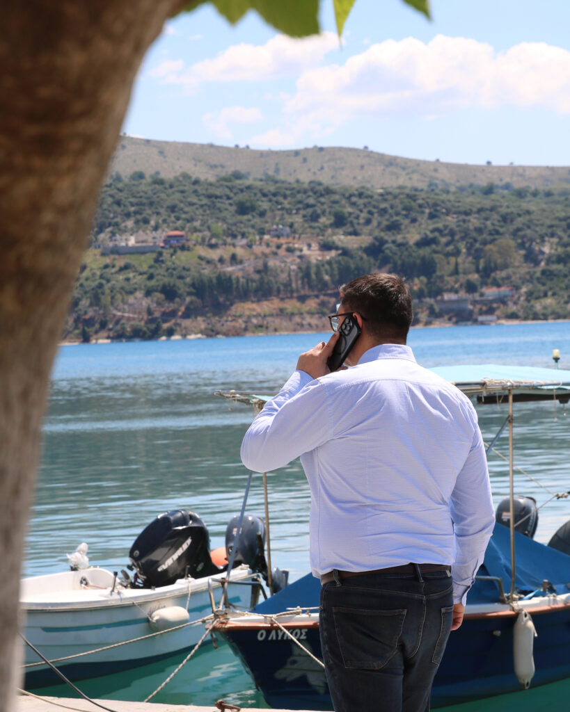The Mayor of Xiromero discussing fish farm expansion. The local municipality, one of the poorest in the country, must balance employment needs with environmental protection. Credit: Ryan Green/The Outlaw Ocean Project