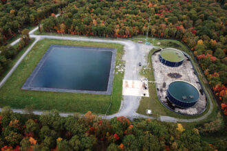 An oil wastewater pond and storage tanks at a site in Clearfield County, Pennsylvania. Credit: Ted Auch/FracTracker Alliance