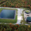 An oil wastewater pond and storage tanks at a site in Clearfield County, Pennsylvania. Credit: Ted Auch/FracTracker Alliance