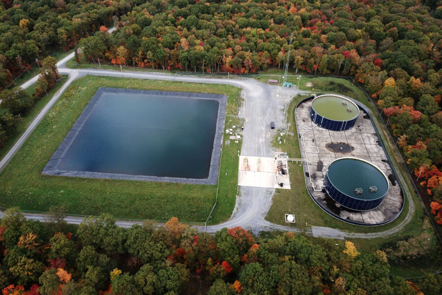 An oil wastewater pond and storage tanks at a site in Clearfield County, Pennsylvania. Credit: Ted Auch/FracTracker Alliance