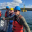 Anthony Viselli, chief engineer at the Advanced Structures and Composites Center at the University of Maine, explains the workings of a floating turbine. Credit: Nathaniel Eisen/Inside Climate News