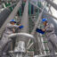 Maintenance workers clean substation equipment at in the Yanqing district of Beijing. Credit: CFOTO/Future Publishing via Getty Images