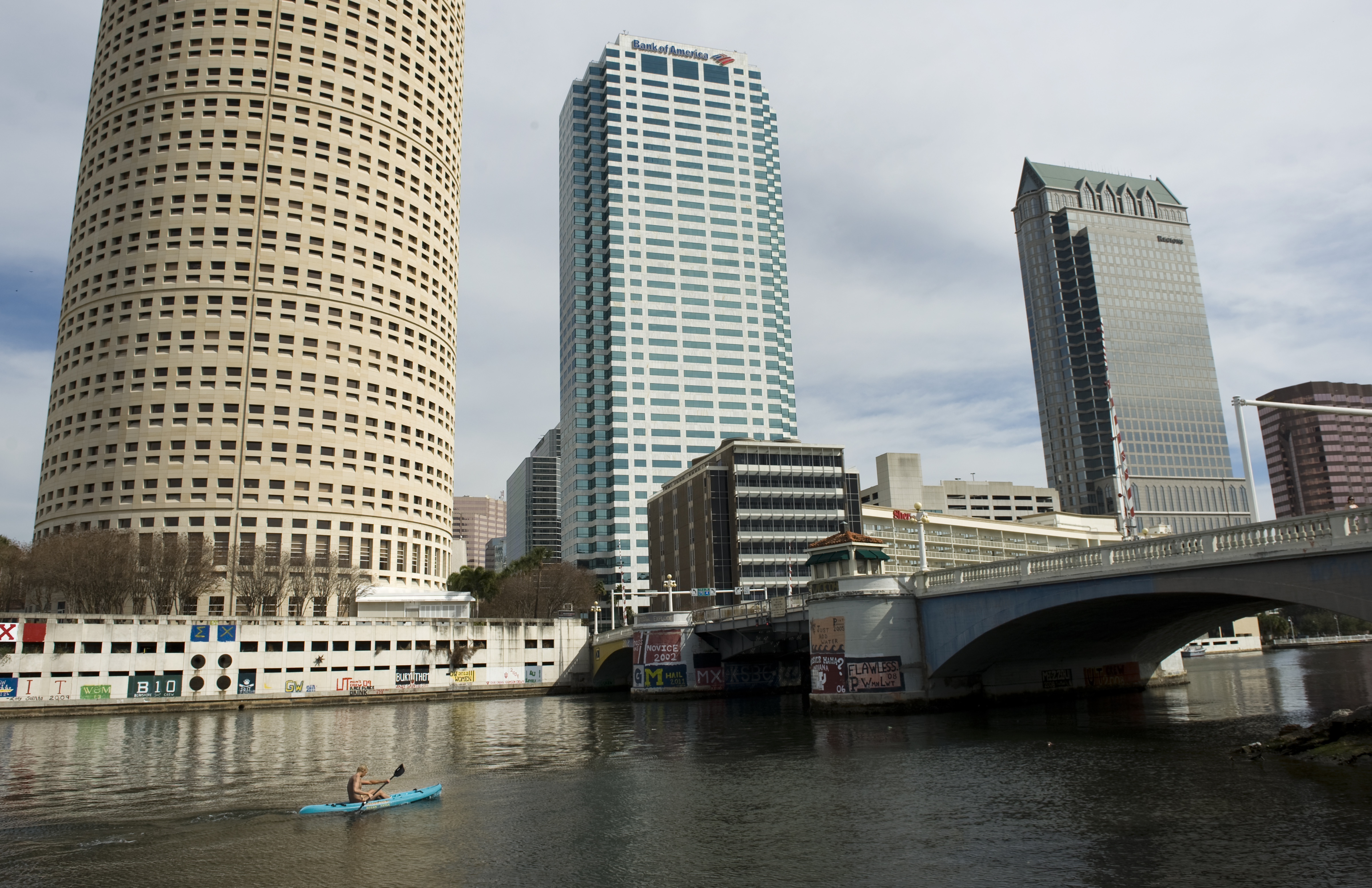 A canoer passes along the Hillsborough River among the office buildings downtown in Tampa, Florida, on Jan. 22, 2012. Credit: Linda Davidson/The Washington Post via Getty Images