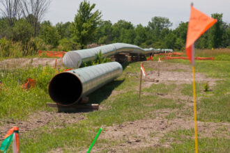 The construction of a crude oil pipeline in Marysville, Mich. Credit: Jim West/UCG/Universal Images Group via Getty Images