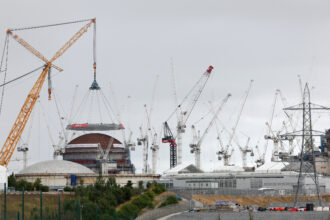 A domed roof is installed during construction of the Hinkley Point C nuclear power station near Bridgwater in southwest England on July 17, 2025. Credit: Adrian Dennis/AFP via Getty Images