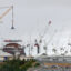 A domed roof is installed during construction of the Hinkley Point C nuclear power station near Bridgwater in southwest England on July 17, 2025. Credit: Adrian Dennis/AFP via Getty Images