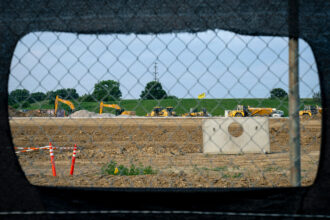 Equipment sits idle at the construction site of a 480,000-square-foot AI data center on July 24, 2025, in Lewis Center, Ohio. Credit: Eli Hiller/The Washington Post via Getty Images