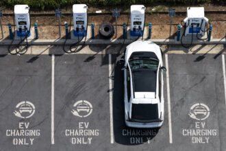 An EV charges at a station in Monrovia, Calif., on March 30. Credit: Justin Sullivan/Getty Images